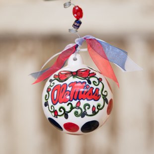 OLE Miss Ball Ornament. Have a “Hotty Toddy” Christmas with the Ole Miss Logo Porcelain Ball Christmas Ornament From Glory Haus. A Must-have for All Ole Miss Fans! Comes with a Decorative Ribbon & Packaged in a Gift Box for Perfect Presentation.