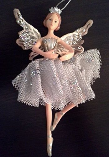 December Diamonds Ballerina Porcelain Ornament-Dancer has Strawberry Blond Hair with Beautiful Ballerina Dress & Tiara. Positioned with Both Arms in a Circle in Front of her Body & one Foot on Toes & the other Foot along the Side of the Pointed Toe Leg.Approximately 5 inches tall