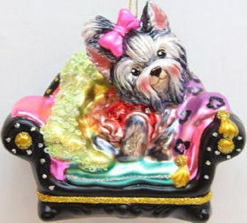 December Diamonds Glass Precious Female Yorkshire Terrier sitting on her Sofa…Adorable Pink Bow in her hair…Colorful & Fun Ornament!!! Adorable Face & Fantastic Detail!!