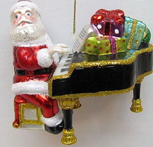 December Diamonds Santa Playing his Baby Grand Piano is a Blown Glass & Hand painted Ornament. Ready to Hang on a Gold Cord.Retired Limited Edition!