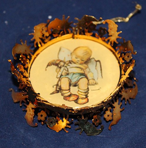 Hummel Gold Christmas Ornament Collection – Sleepy Time Featuring a Boy Who Fell asleep holding his favorite toy