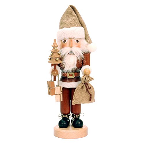 Alexander Taron Importer 32-333 This Ulbricht/Seiffener Santa Nutcracker Is Holding a Christmas Tree an d a Sack Of Presents an d Is in  Natural Wood Finish.
