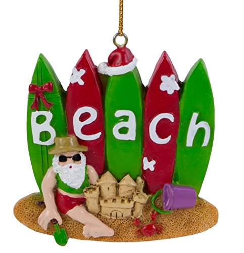 Santa with Surfboards and Sandcastle on the Beach Ornament